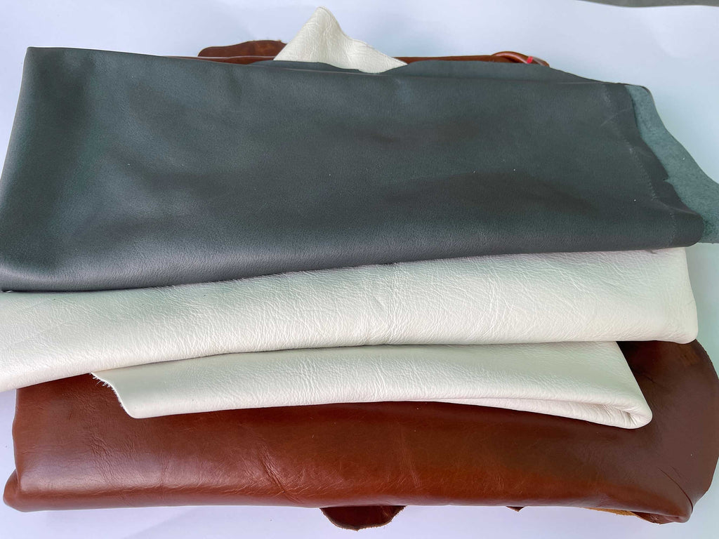 Large leather remnants or scraps for  crafts, leather working, wallets and more.